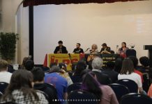 PBI-Canada coordinator moderates panel with land defenders, peasant leader, activists discussing militarism, megaprojects