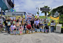 Nomadesc stands with SINALTRAINAL union members at Nestlé factory in Bugalagrande, Colombia